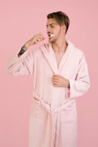 Person brushing their teeth as part of a morning routine