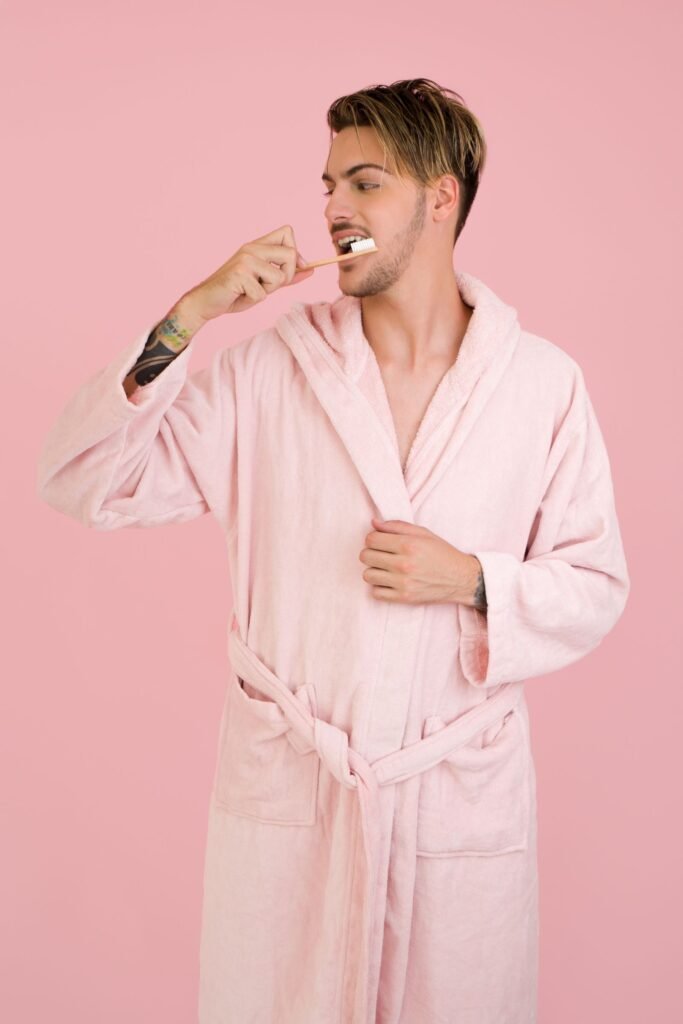 Person brushing their teeth as part of a morning routine