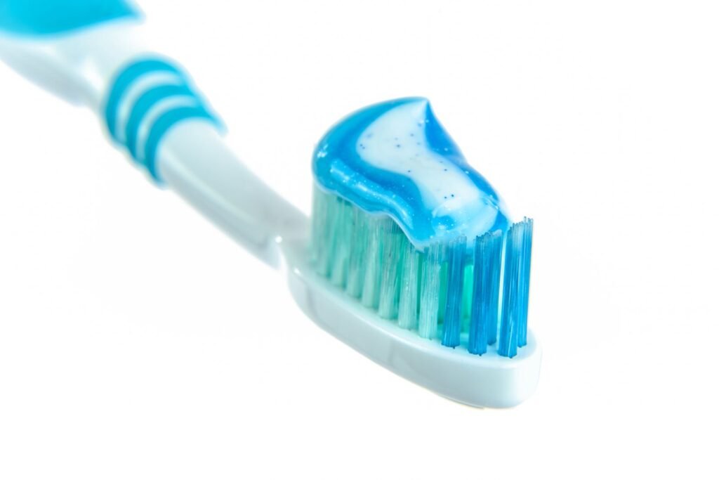 Toothbrush with whitening toothpaste, close up